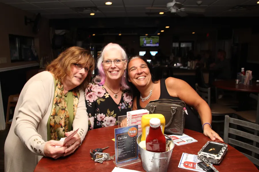 Guests and food at 1048 Bar & Grill