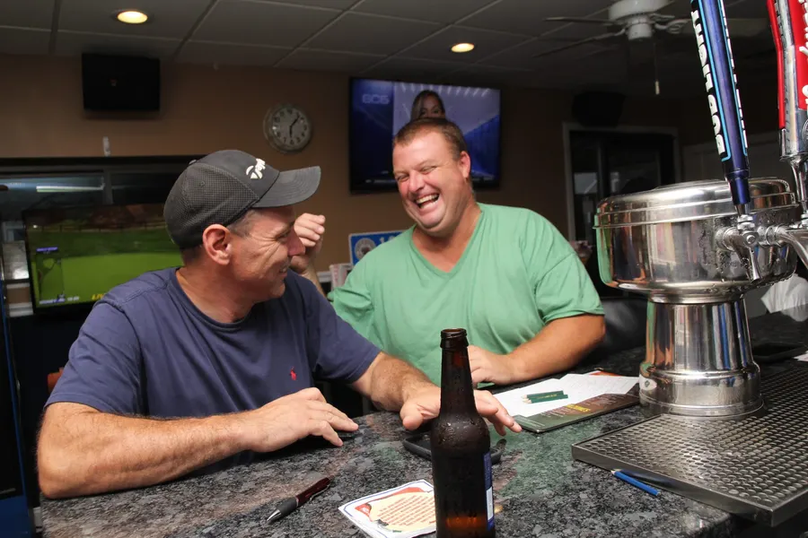 Guests and food at 1048 Bar & Grill