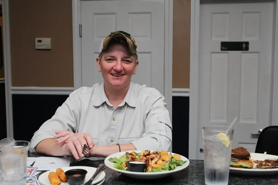 Guests and food at 1048 Bar & Grill