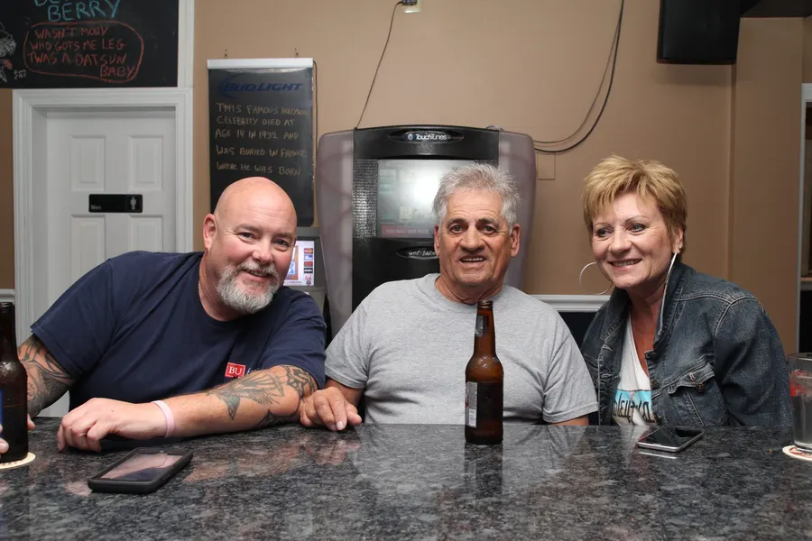 Guests and food at 1048 Bar & Grill