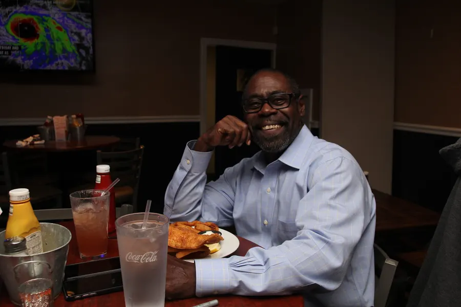 Guests and food at 1048 Bar & Grill