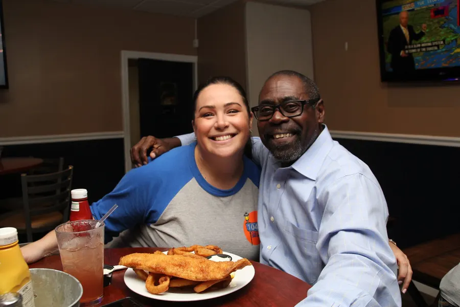 Guests and food at 1048 Bar & Grill