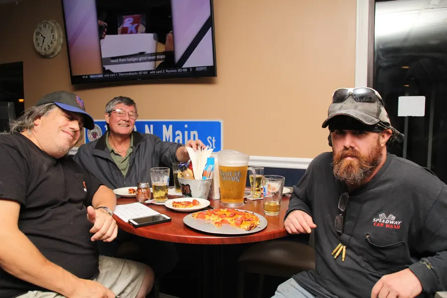 Guests and food at 1048 Bar & Grill
