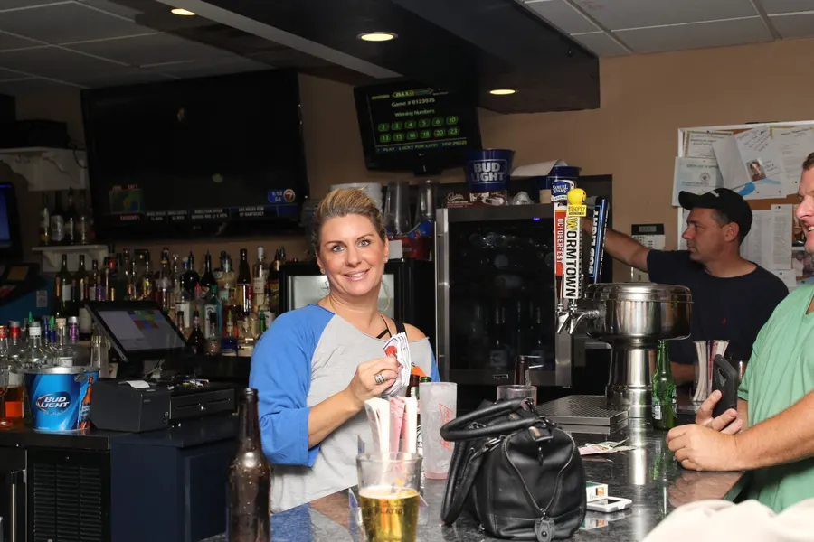 Guests and food at 1048 Bar & Grill