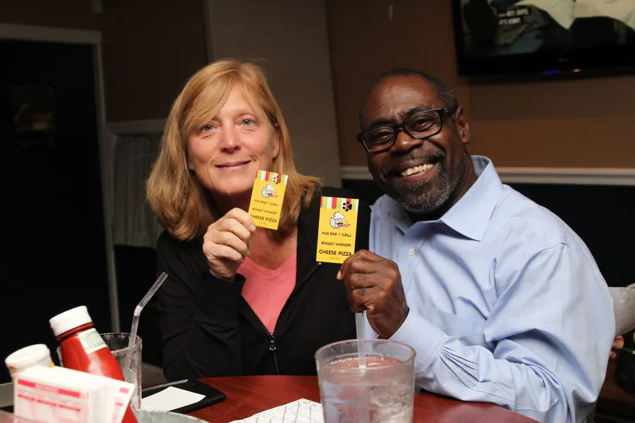 Guests and food at 1048 Bar & Grill