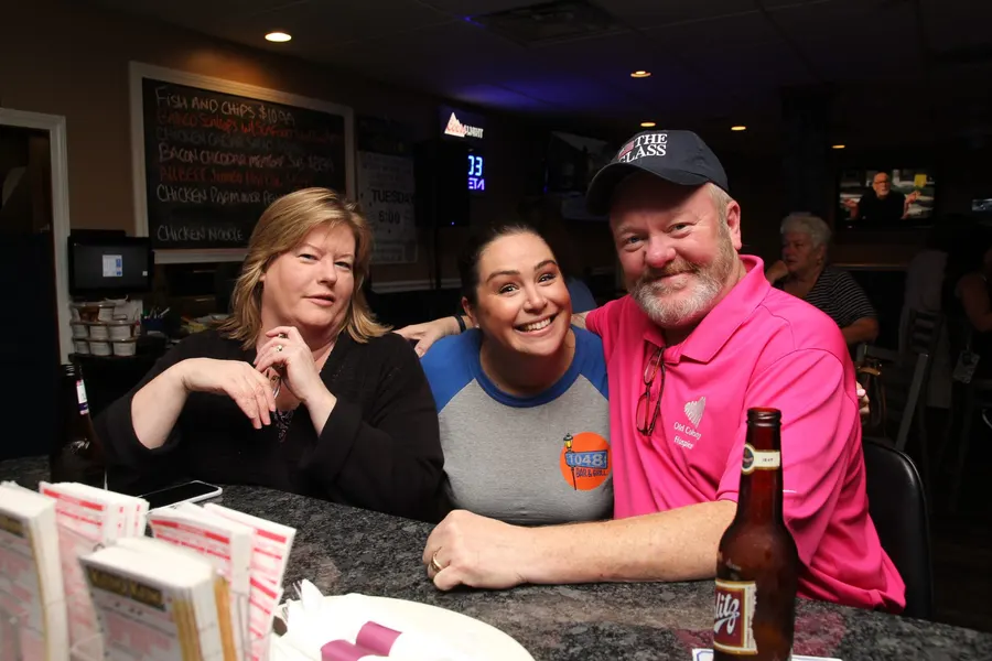 Guests and food at 1048 Bar & Grill