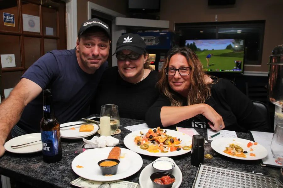 Guests and food at 1048 Bar & Grill