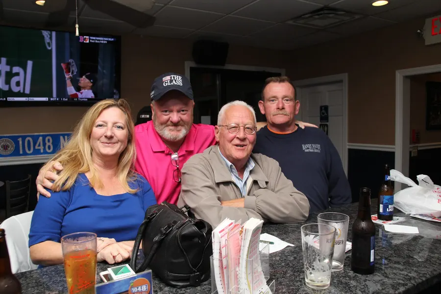 Guests and food at 1048 Bar & Grill