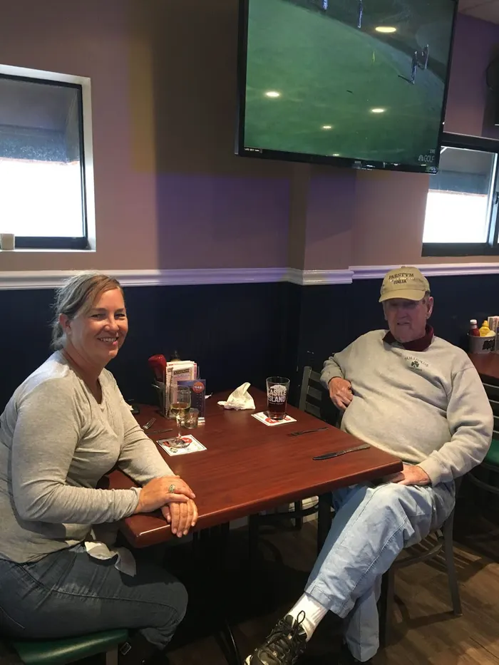 Guests and food at 1048 Bar & Grill